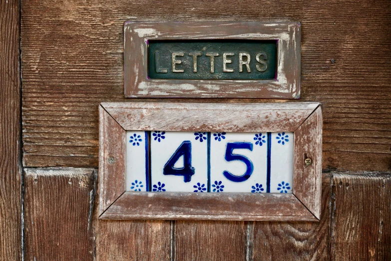the letters and numbers on the front of the door have been made into numbers