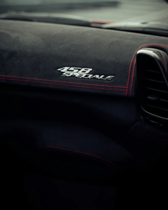 the interior of a car is shown with red trim