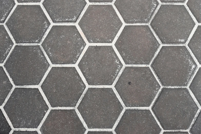 grey and white concrete with small lines made from squares