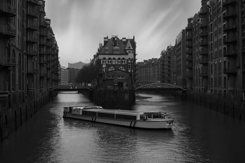 a boat that is floating down some water