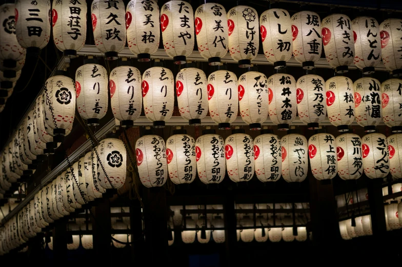 a ceiling with hanging lights in oriental style