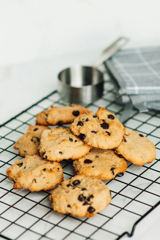 several cookies are sitting on a cooling rack