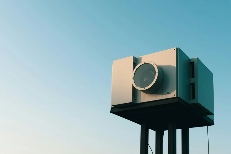 a clock is shown on top of the tower