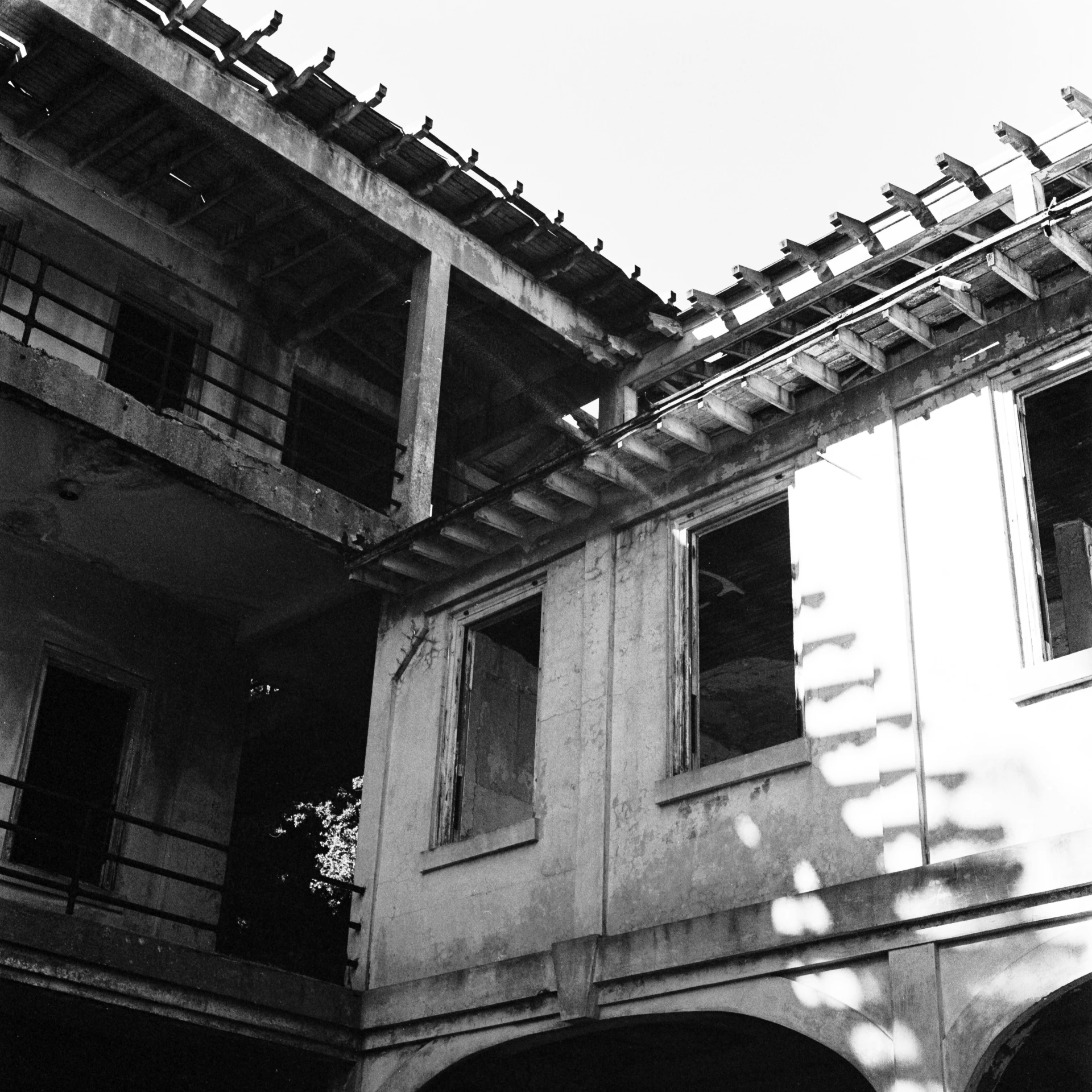 the view from below an old building looking out at the surrounding area