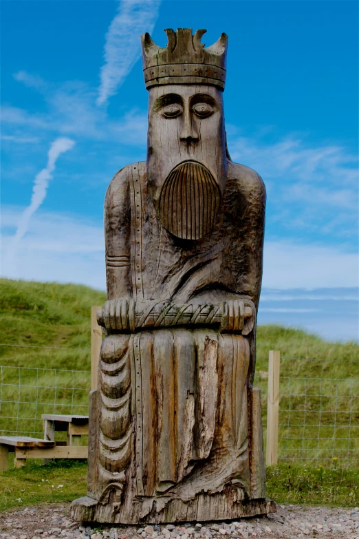 a statue of a man with a crown on his head