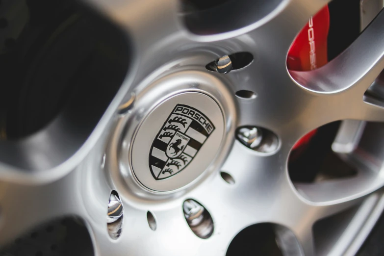 the emblem of a car wheel is seen