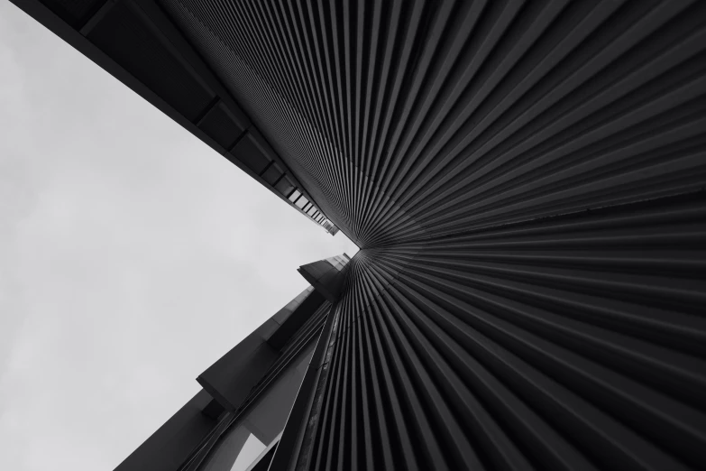 looking up into the sky at a building