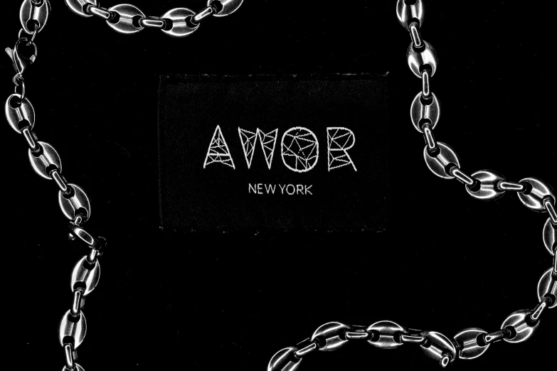 a black background with chains on the bottom