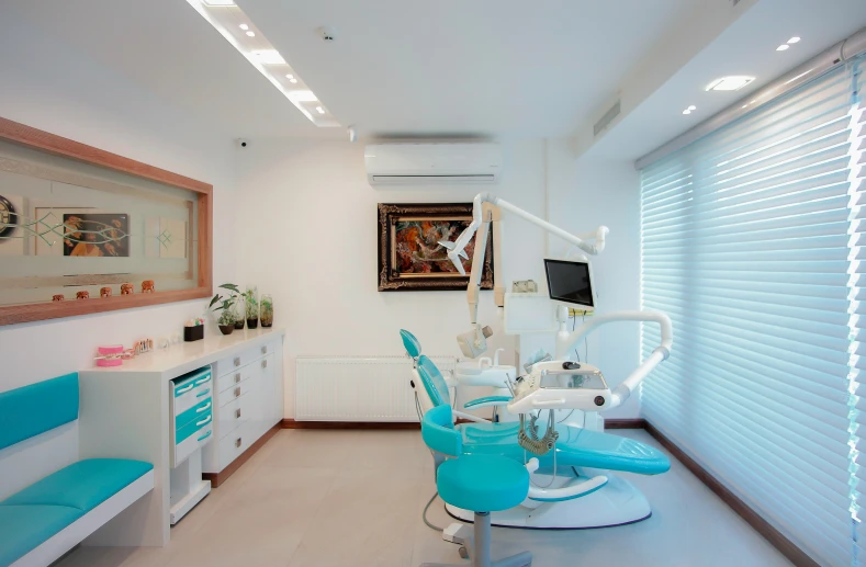 a dental room with dental equipment in it