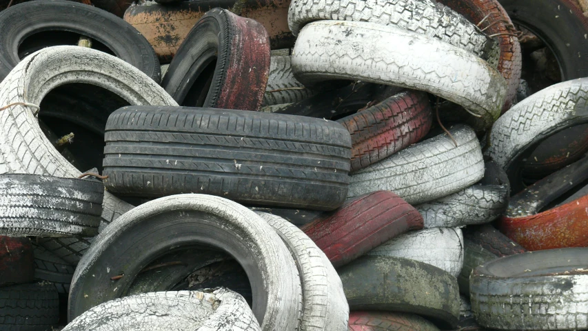 a pile of tires piled on top of each other