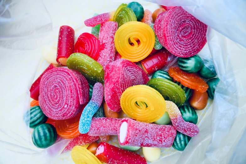 brightly colored candy candy is shown in an arrangement