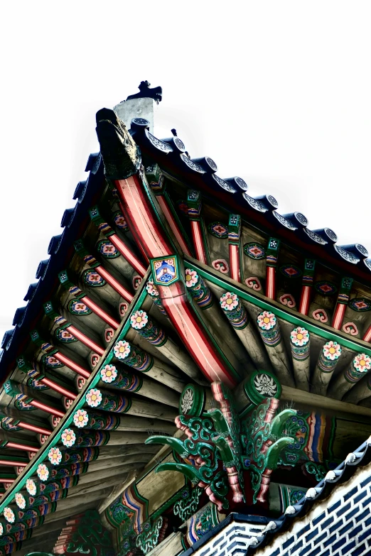 an elaborate roof with crosses and dragon decoration