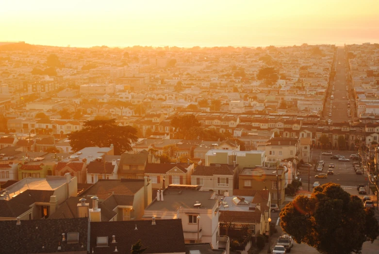 a city is seen in this po during sunset