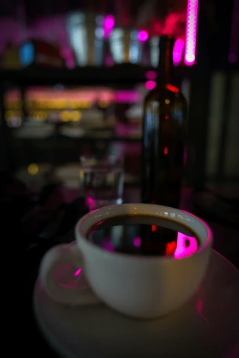 there is a cup of coffee on a saucer