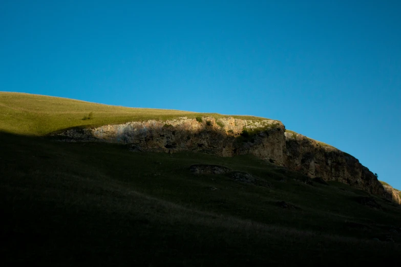 an image of a hillside in the afternoon