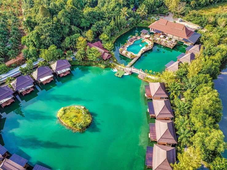 an aerial view of the pool area at the resort