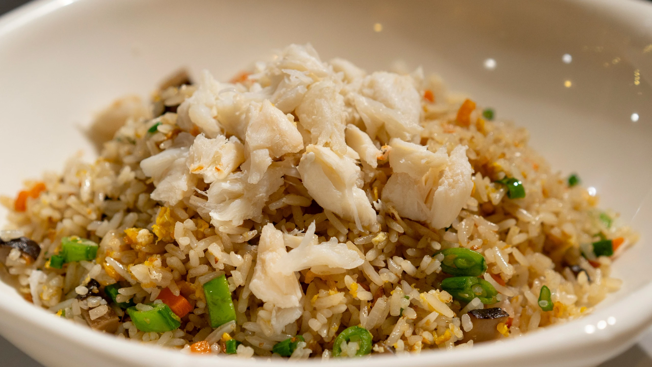 some rice has been prepared and is sitting in a bowl