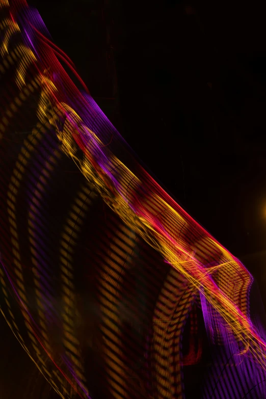 colorful lights show a bright neon pattern on the ceiling