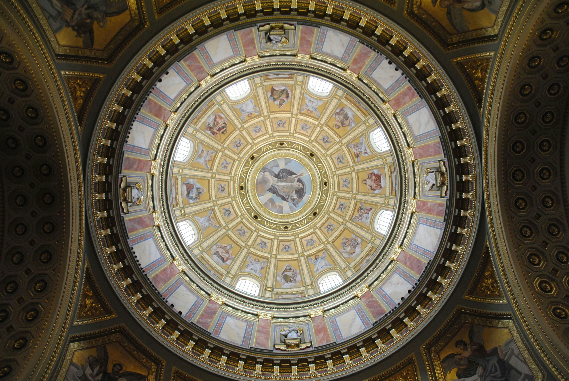 an ornate ceiling view of a very old church