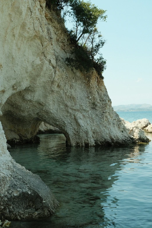 an image of a rocky cliff overlooking the water