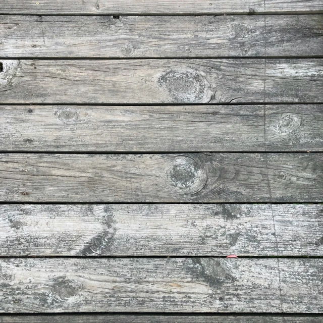 the wooden planks have been made to look like it is weathered