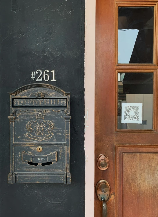 a mail box is on the side of a house