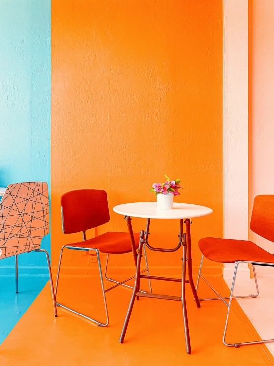 a colorful room with an orange and blue accent