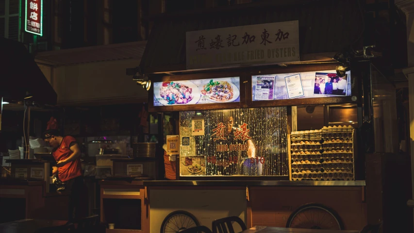 a restaurant with an asian display of food