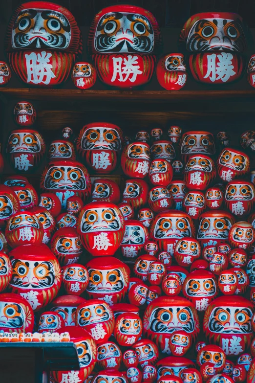 orange jars are on display next to each other