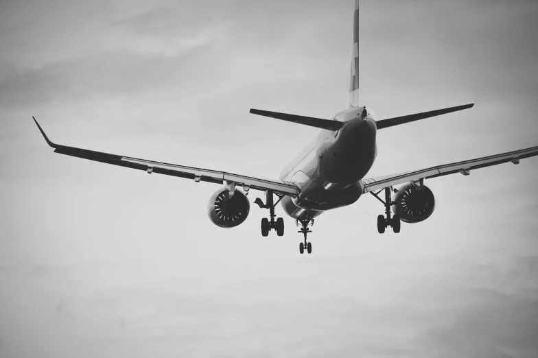 a large passenger jet flying in the air