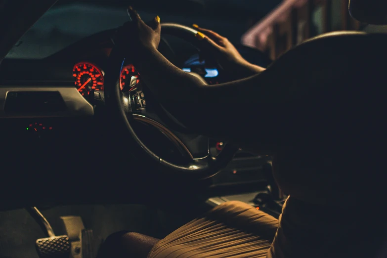 someone in the car has their hand on the dashboard