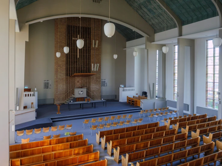 the church has several wooden chairs in it