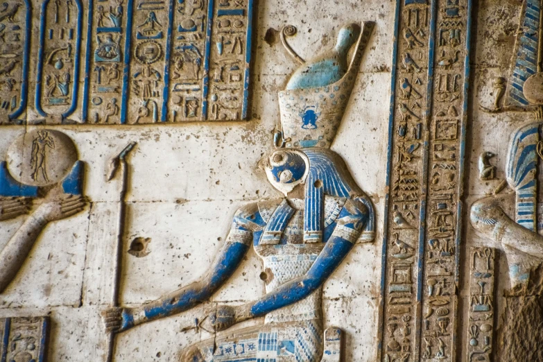 an egyptian relief depicting pharaohs and the hieroglyphics