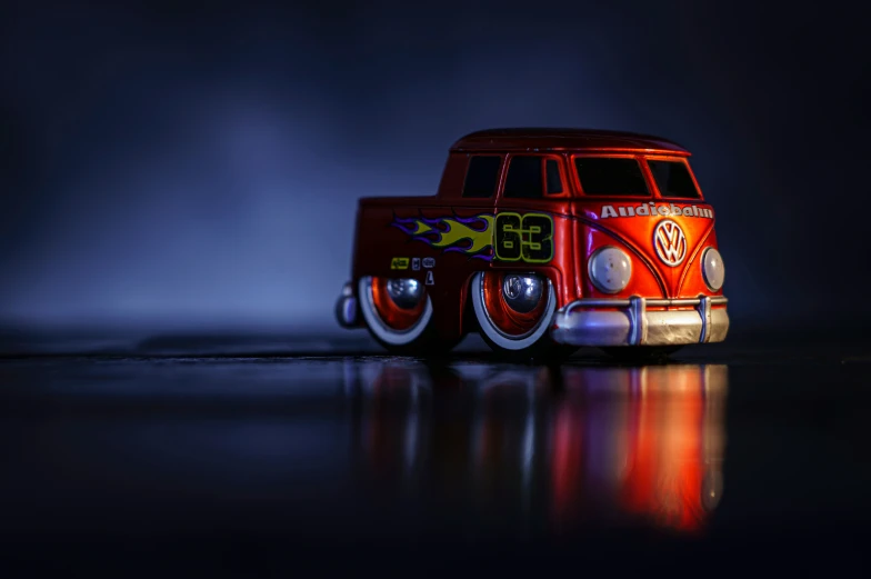 an orange van parked on a wet surface