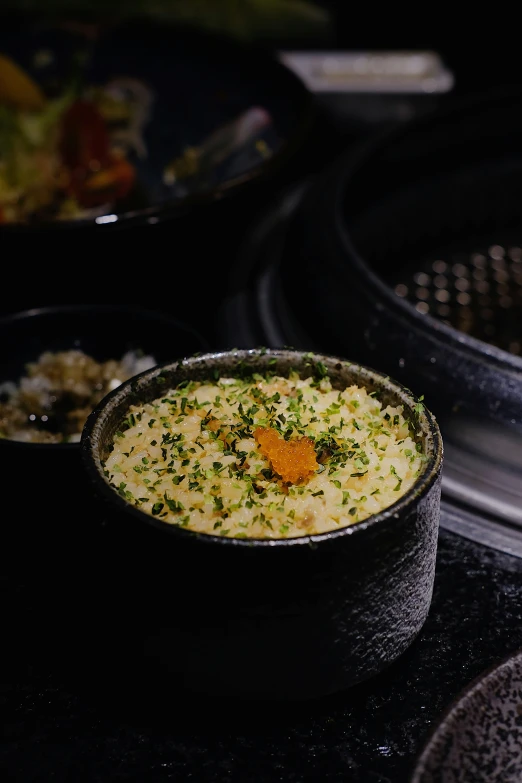 soup and side dishes sit in a restaurant setting