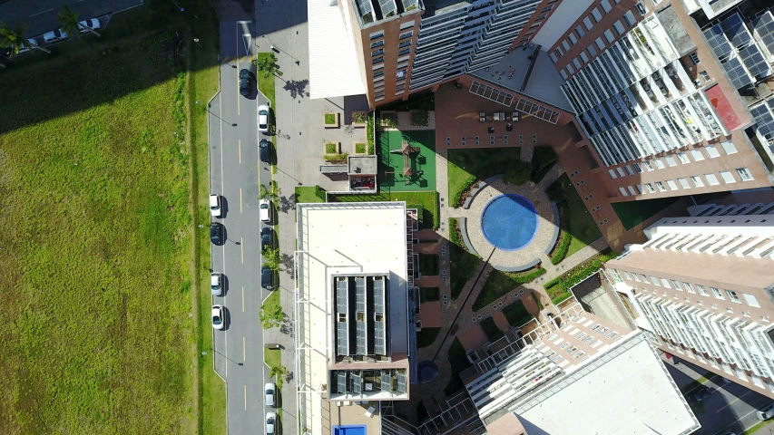 the view from a bird - eye s of a city with a swimming pool