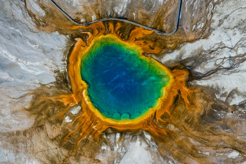 an aerial view of the blue and green water