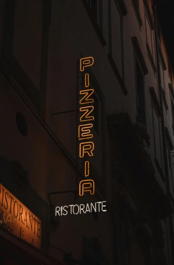 a sign on a building reads robertora restaurant