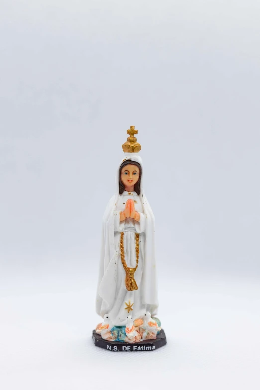 a figurine of a woman in a wedding dress