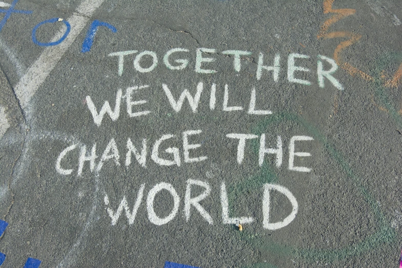 a sidewalk with some words written on it