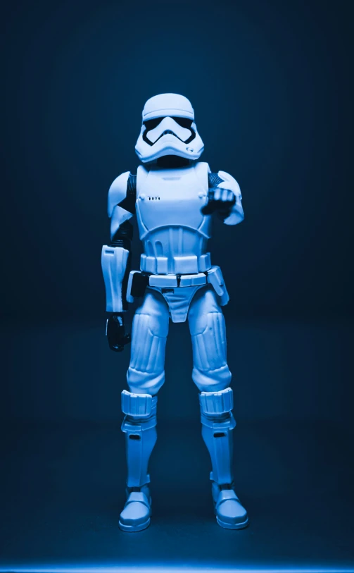 the star wars character figure has a light blue helmet and a star wars helmet