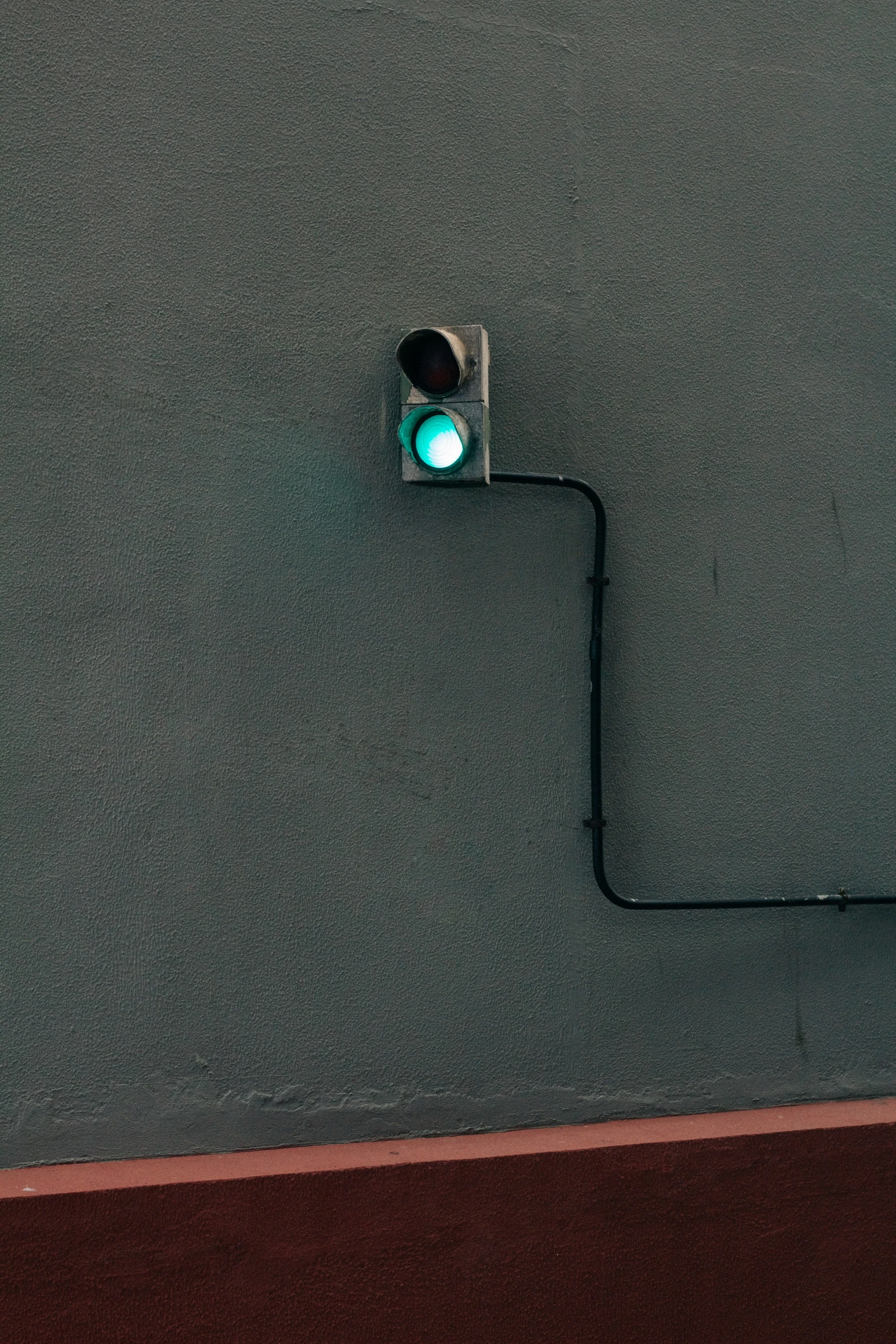 a traffic light is green on a street corner