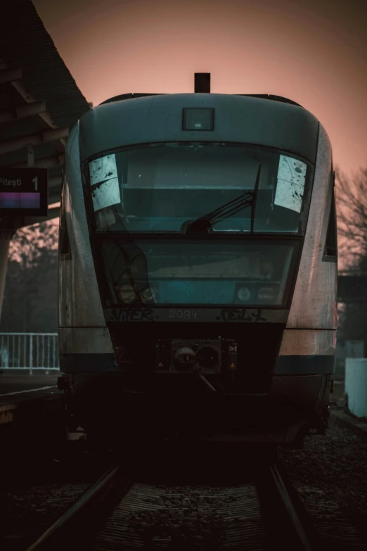 the back end of a train is at a station