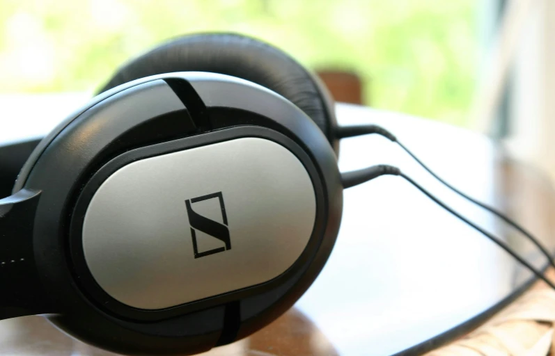 a pair of headphones resting on top of a table