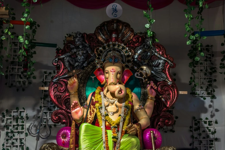 a statue of lord gandapas inside of a shop