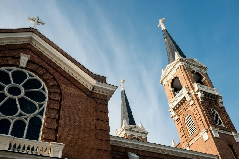 a large tall church with a steeple on it