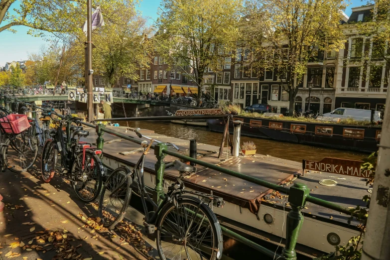 there is a bike rack lined with bicycles