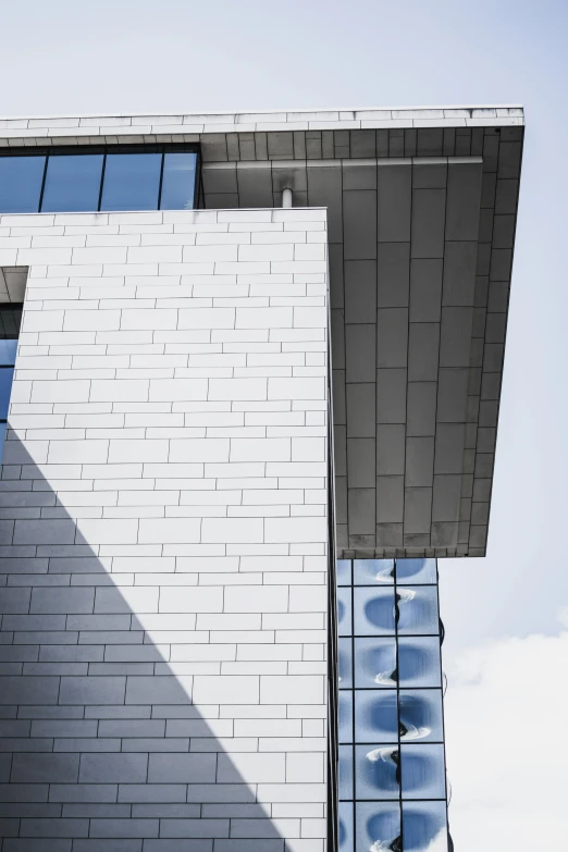 the side of a building with many windows on it