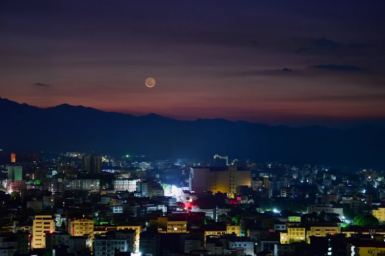 night view of city from atop a skyscr in an urban area