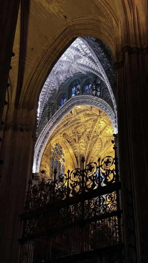 a very tall cathedral with a beautiful glass ceiling